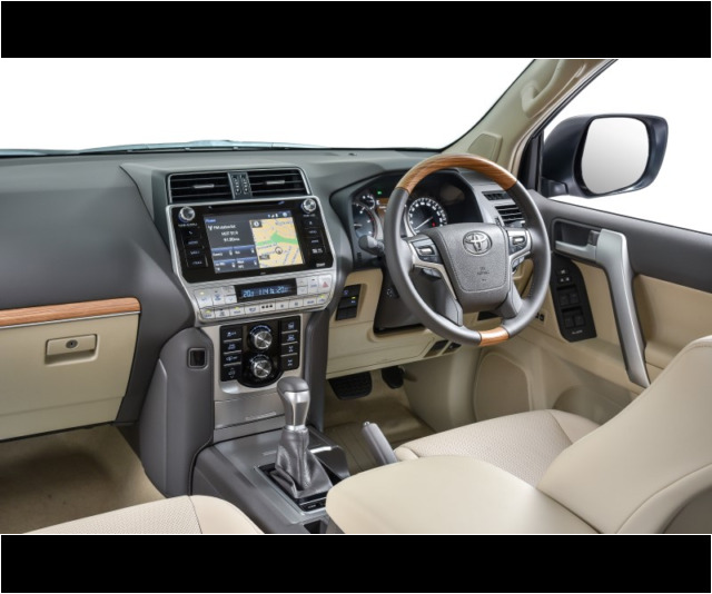 Spacious cabin
has all the goodies.
Dark trim is the more
sensible choice though. Spacious cabin has all the goodies. Dark trim is the more sensible choice though.